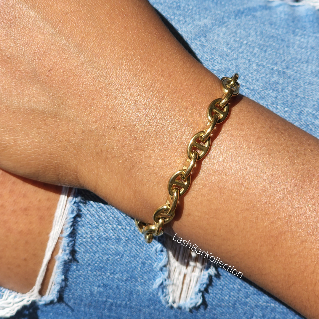 The toggle clasp ensures that the bracelet will stay securely around your wrist. Whether you want to rock the look during the day or at night, it sure beats wearing the same old boring bracelet.  Great for stack bracelet set• Quality stainless steel• 18k Gold plated• Tarnish free• Hypoallergenic. Shipping from Florida