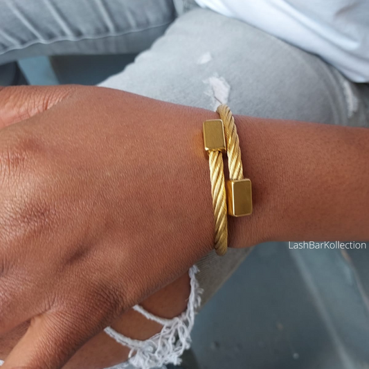 Simple yet elegant piece to wear with a classic and timeless spiral design. This sleek and chic Spiral Bracelet is the perfect addition your outfit.  Adding the Spiral Bracelet is perfect for accent jewelry to your outfit and your jewelry collection. • Quality stainless steel• 18k Gold plated• Tarnish free• Hypoallergenic 